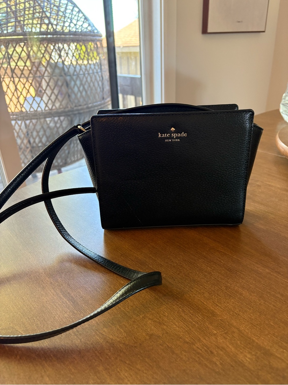 Black Kate Spade crossbody bag